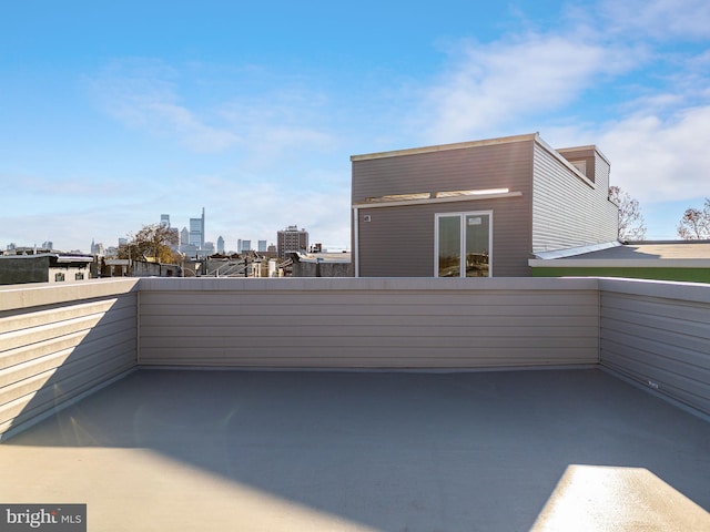 view of patio featuring a balcony