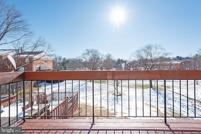 view of snow covered deck