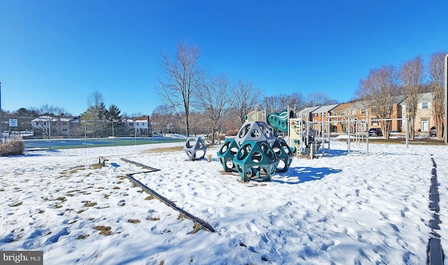 view of snow covered playground