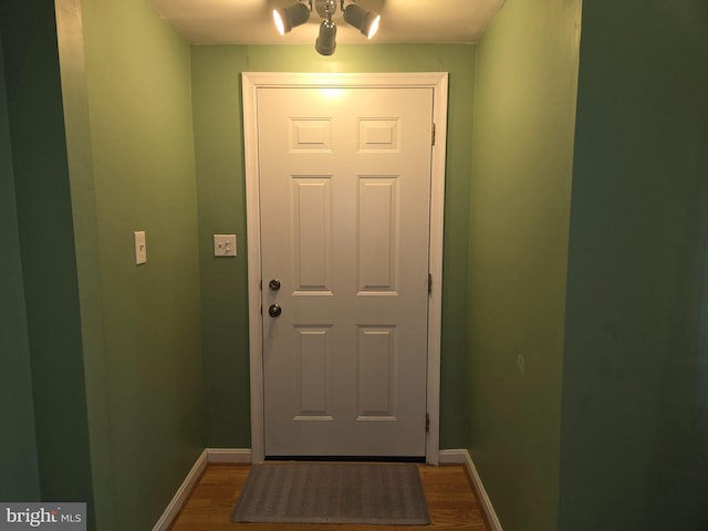 doorway featuring hardwood / wood-style floors