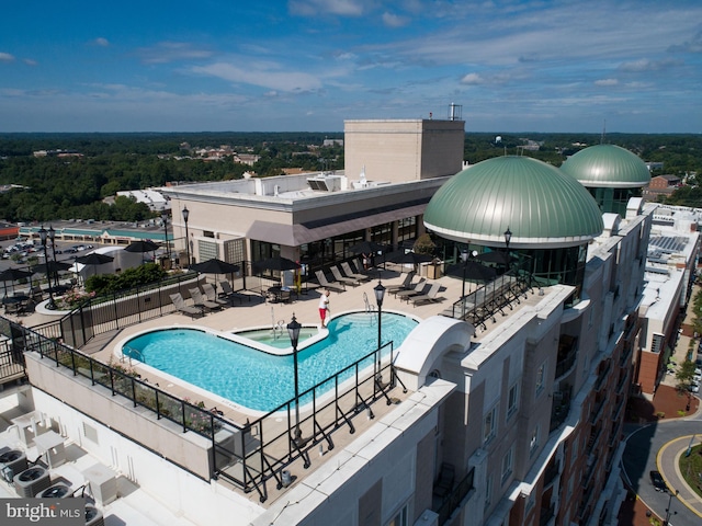 view of pool featuring a patio area