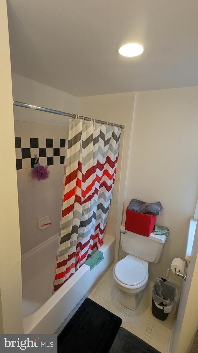 bathroom with toilet and shower / bathtub combination with curtain