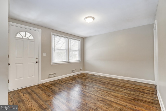 entrance foyer with dark hardwood / wood-style flooring