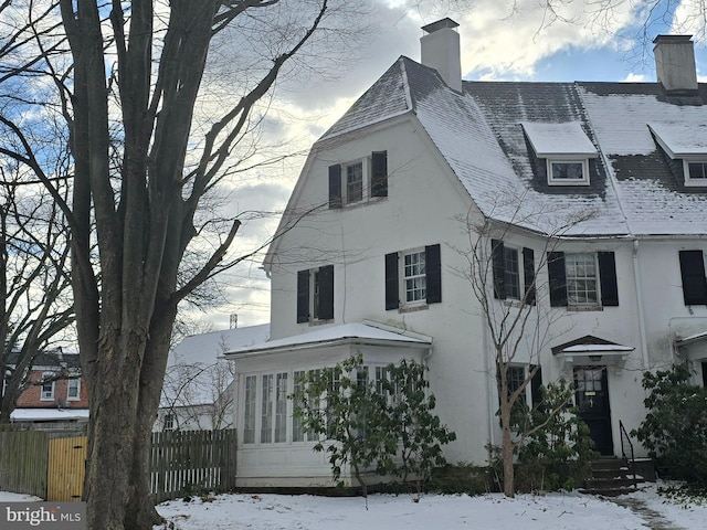 view of snow covered property