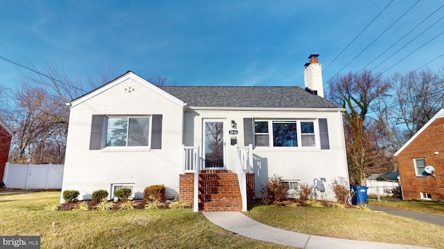 view of front of home featuring a front lawn