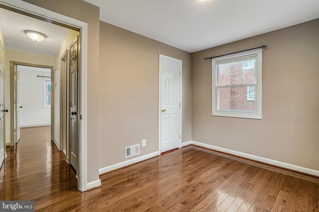 interior space with hardwood / wood-style flooring