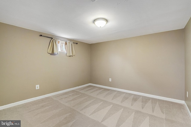 empty room with carpet flooring