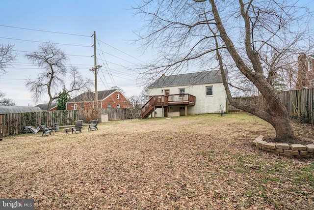 view of yard with a wooden deck