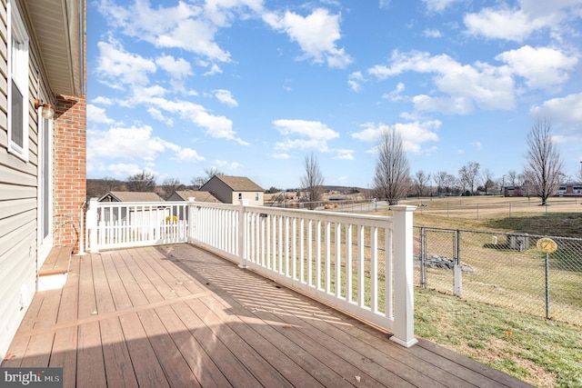 deck featuring a lawn