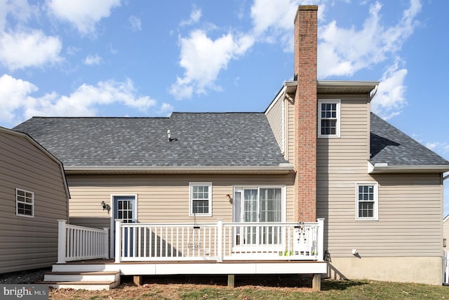 rear view of house with a deck