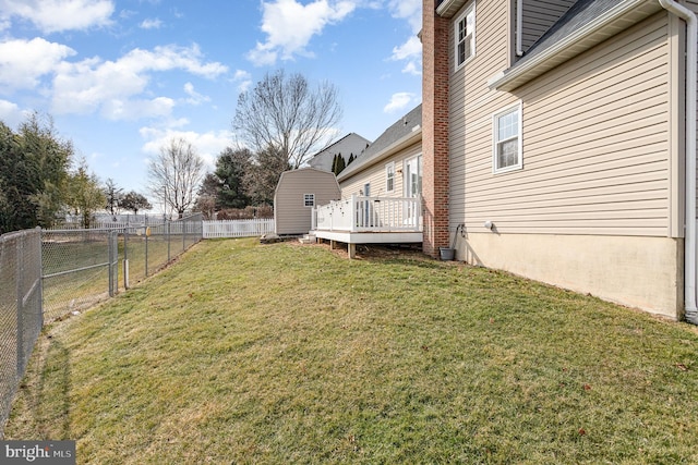 view of yard with a wooden deck