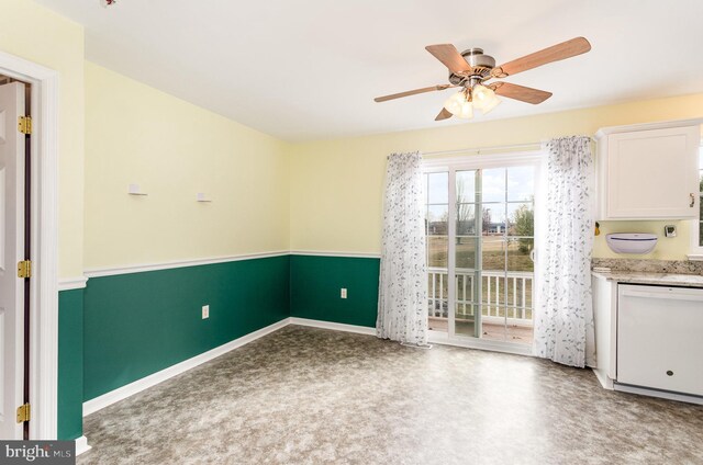 interior space with ceiling fan