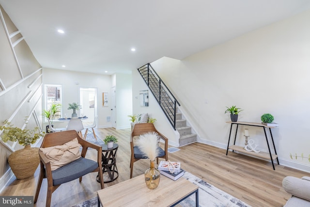 living room with light hardwood / wood-style floors