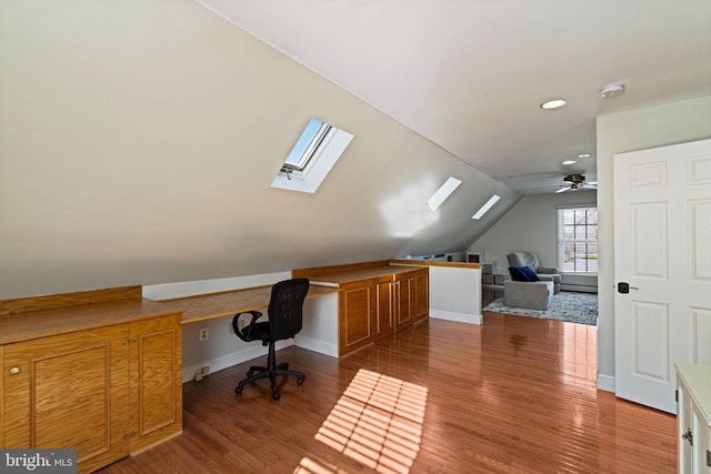 office area with hardwood / wood-style flooring, ceiling fan, and lofted ceiling