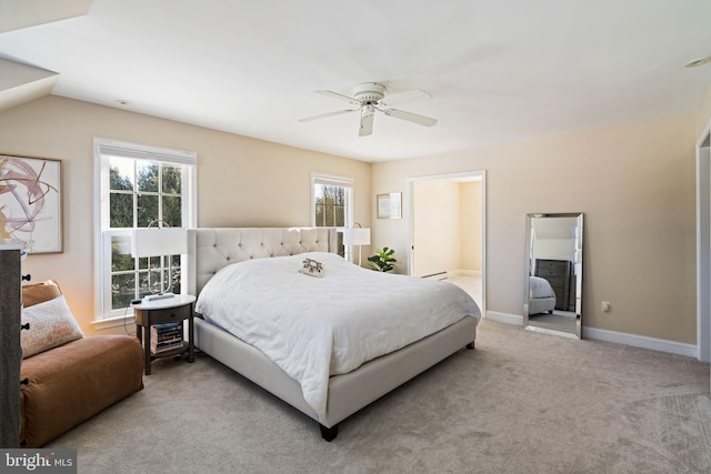 bedroom featuring ceiling fan and light colored carpet