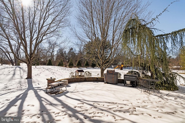 view of snow covered patio