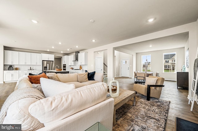 living room featuring dark hardwood / wood-style flooring