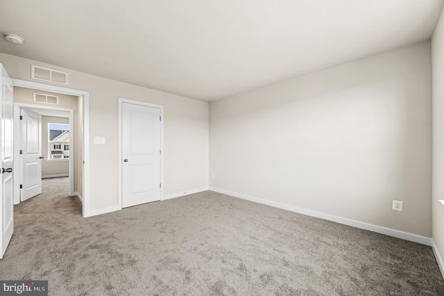 empty room with carpet floors