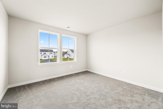 view of carpeted spare room