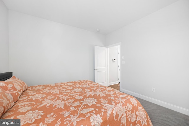 bedroom featuring carpet flooring