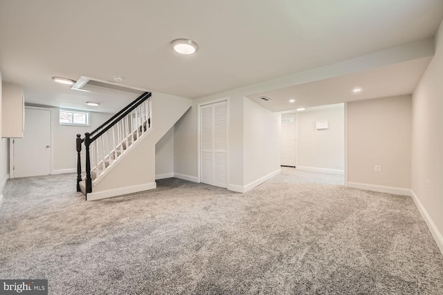 basement featuring carpet flooring