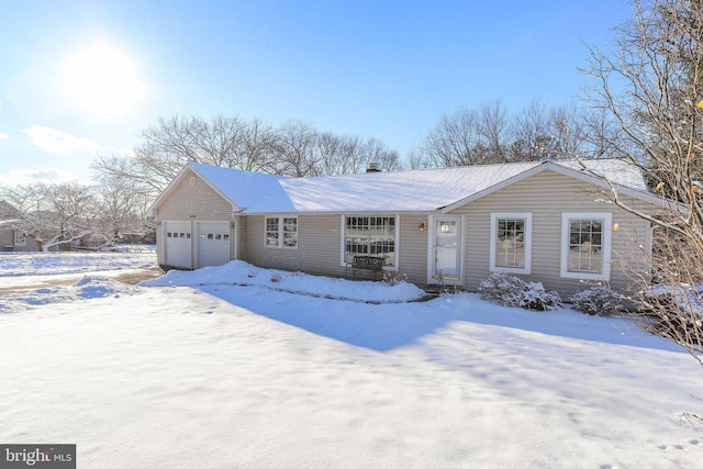 ranch-style home with a garage