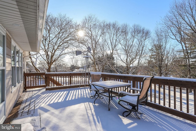 view of snow covered deck