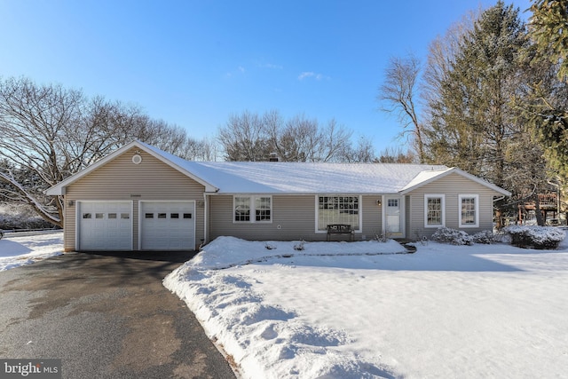 ranch-style house with a garage