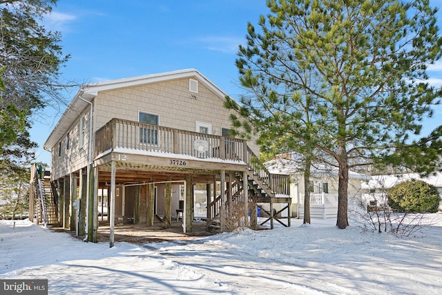 view of front of house featuring a wooden deck