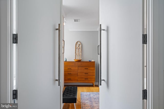 hallway featuring light hardwood / wood-style floors