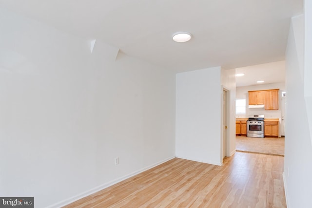 unfurnished room featuring light hardwood / wood-style flooring