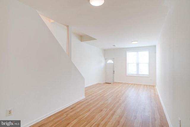 unfurnished room featuring light hardwood / wood-style flooring