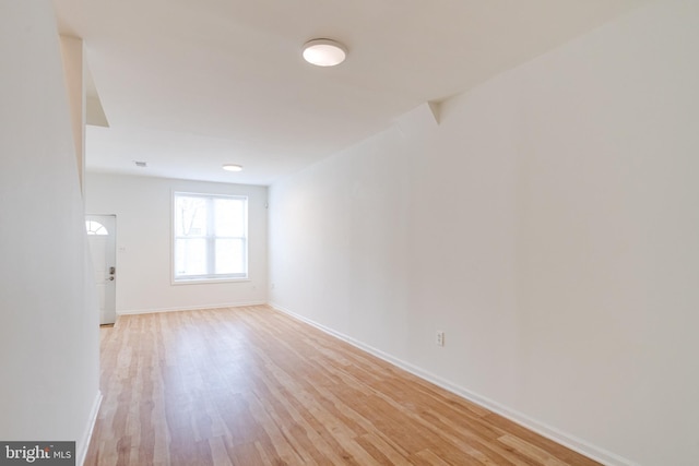 unfurnished room featuring light wood-type flooring