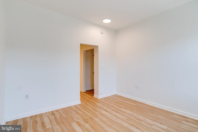 unfurnished room featuring light hardwood / wood-style flooring