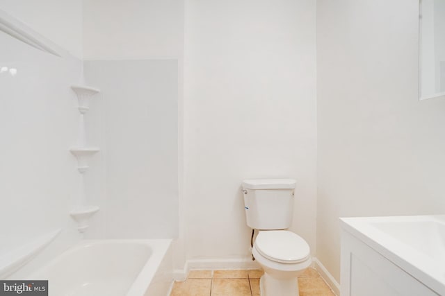 bathroom featuring shower / bathing tub combination, tile patterned floors, and toilet