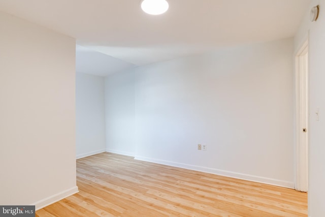 spare room featuring light hardwood / wood-style flooring