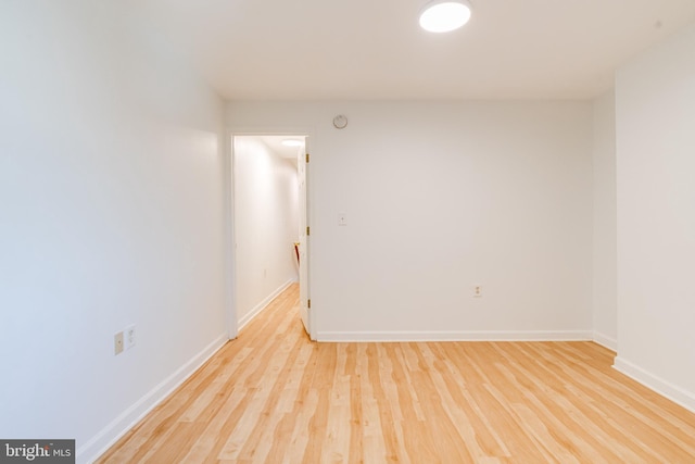 spare room featuring light hardwood / wood-style floors