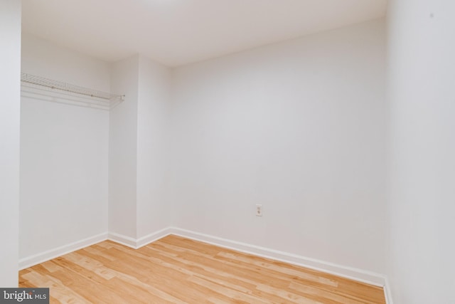 unfurnished bedroom with hardwood / wood-style floors