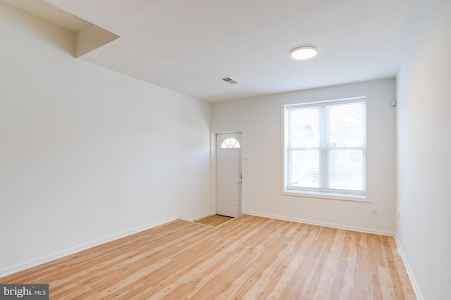 entrance foyer with light wood-type flooring