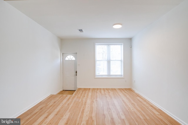 foyer with light hardwood / wood-style flooring