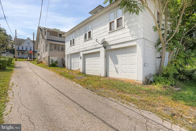 exterior space featuring a garage