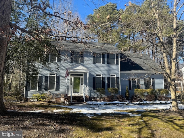 colonial house with a yard