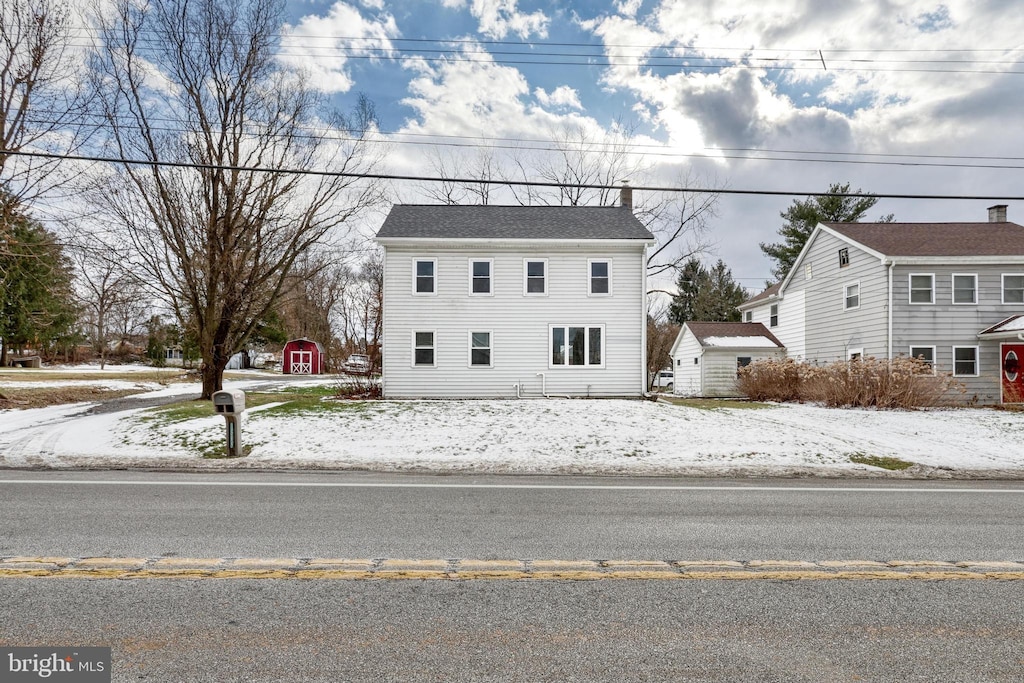 front of property with a storage unit