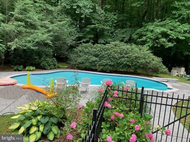 pool featuring fence