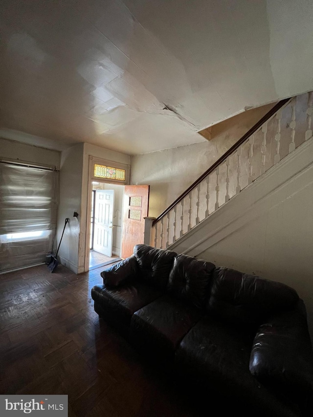 living room with parquet floors