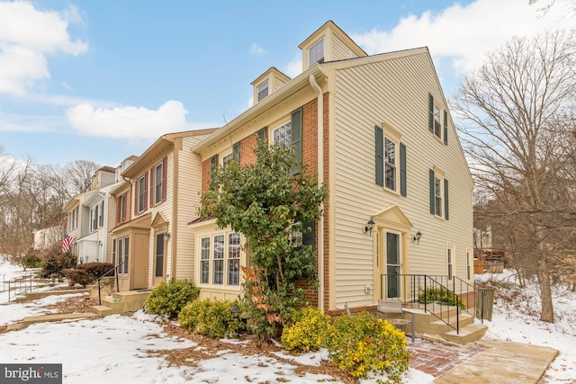 view of snow covered property