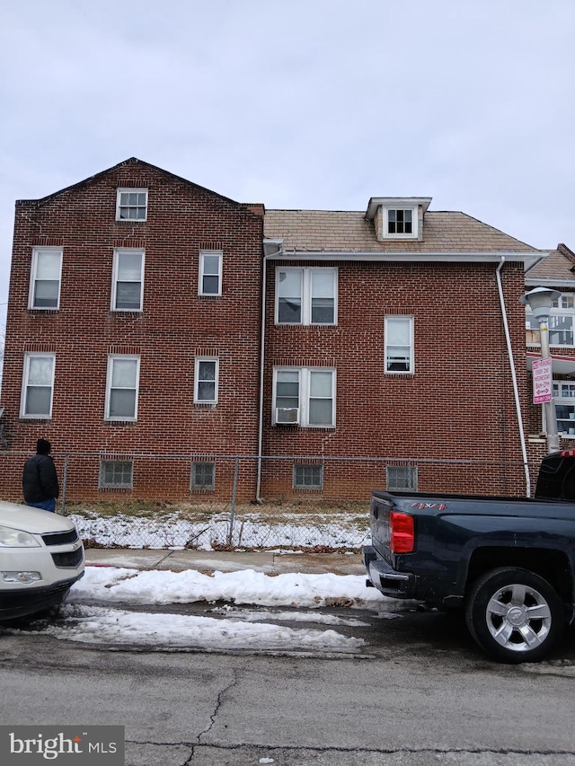 view of snow covered building