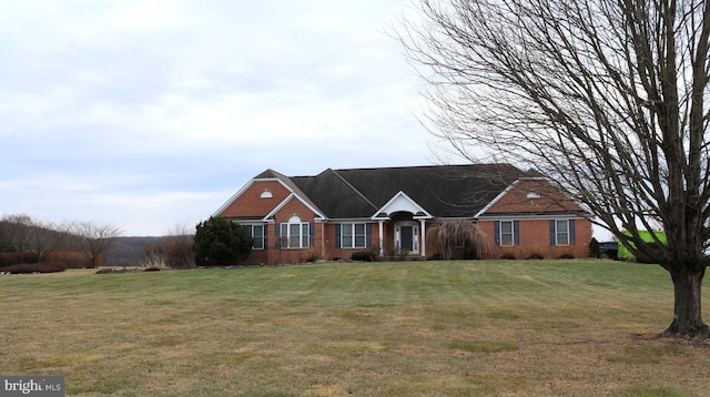 single story home with a front yard