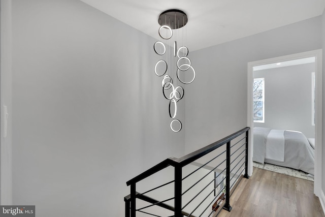 stairway featuring hardwood / wood-style flooring