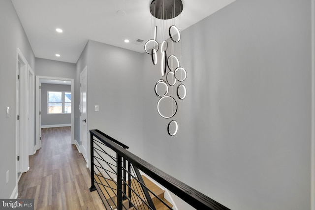 corridor featuring light hardwood / wood-style floors